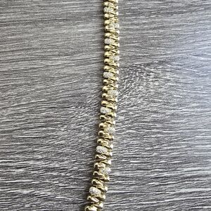 Elegant Gold and Silver Bracelet